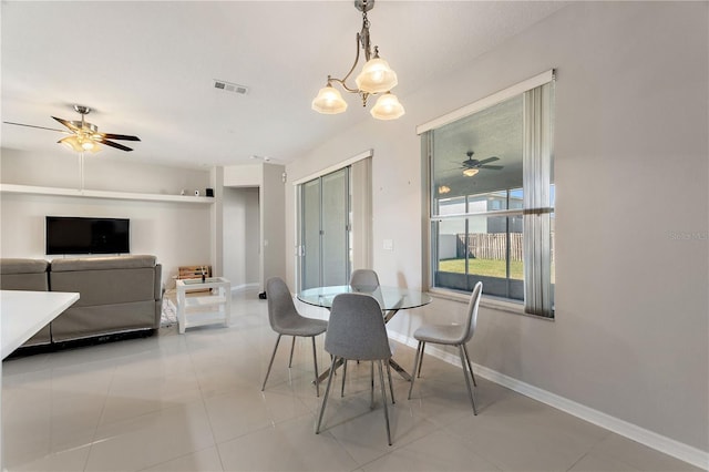 dining area featuring visible vents, baseboards, ceiling fan, and light tile patterned flooring