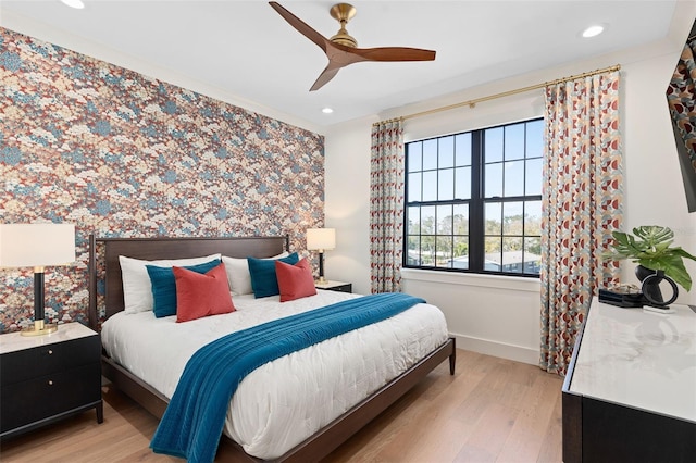 bedroom with recessed lighting, baseboards, light wood-style floors, and a ceiling fan