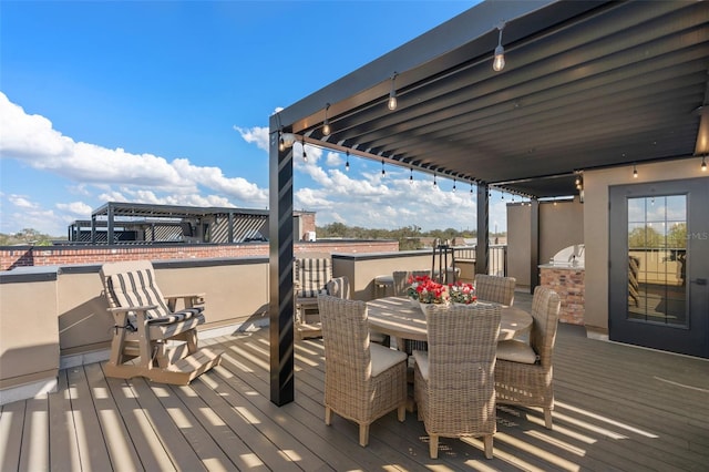 deck with outdoor dining space