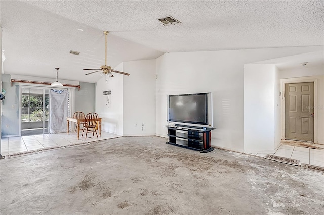 unfurnished living room featuring visible vents, a ceiling fan, a textured ceiling, unfinished concrete floors, and vaulted ceiling