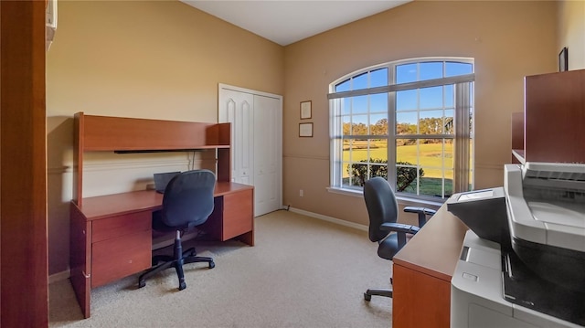 home office with carpet flooring and baseboards