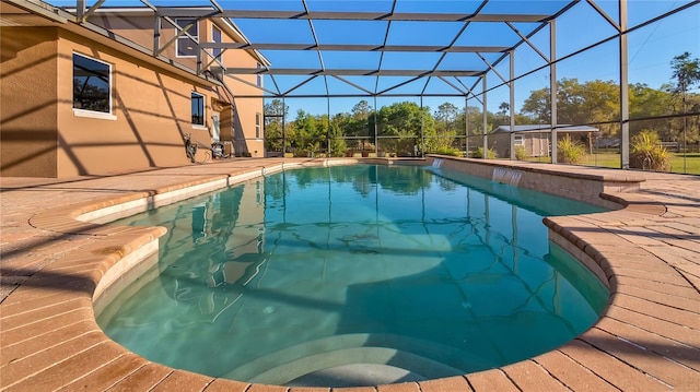 pool with a patio and a lanai