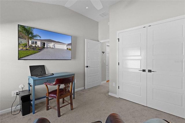 office with lofted ceiling, carpet, visible vents, and baseboards