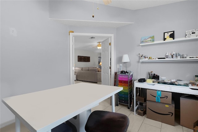 office featuring light tile patterned floors and a ceiling fan