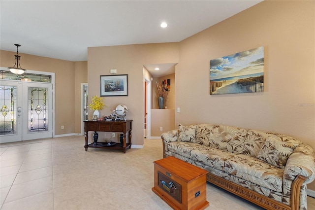 living room featuring recessed lighting, light tile patterned floors, french doors, and baseboards