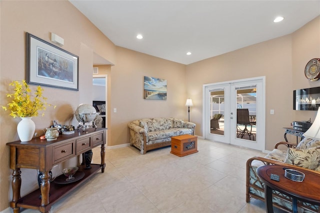 living area featuring recessed lighting, french doors, baseboards, and light tile patterned flooring