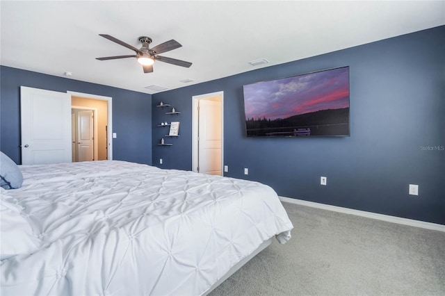 bedroom with visible vents, a ceiling fan, baseboards, and carpet floors