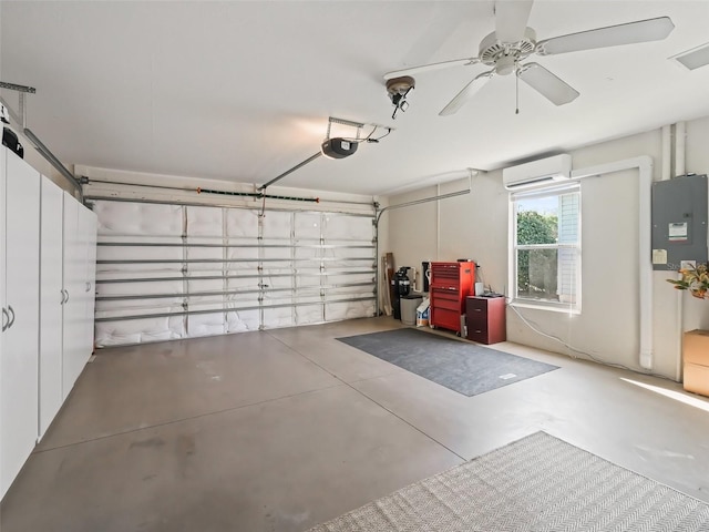 garage with a wall mounted air conditioner, a garage door opener, and ceiling fan