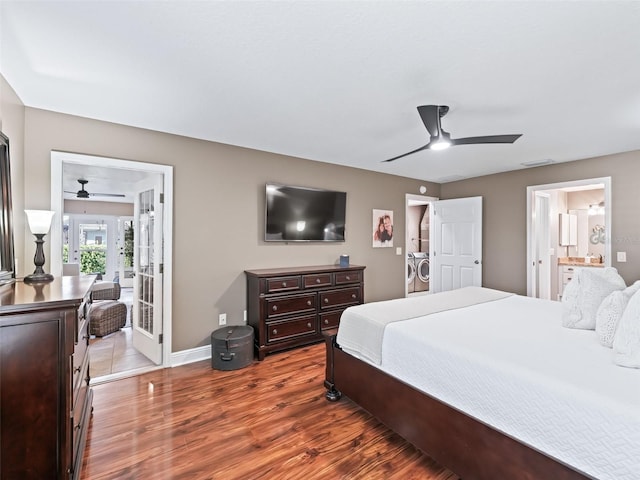 bedroom featuring a ceiling fan, wood finished floors, french doors, baseboards, and washer / dryer