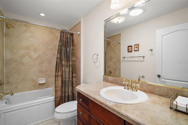 full bathroom featuring vanity, shower / tub combo, and toilet