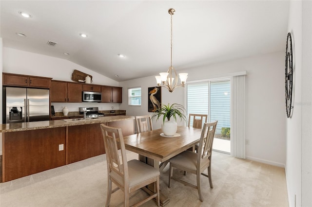 dining room featuring visible vents, lofted ceiling, light carpet, recessed lighting, and an inviting chandelier