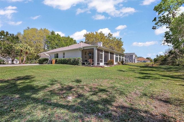 exterior space featuring a sunroom