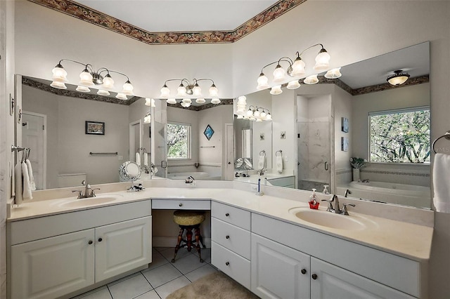 full bathroom featuring a sink, double vanity, a bath, and a shower stall