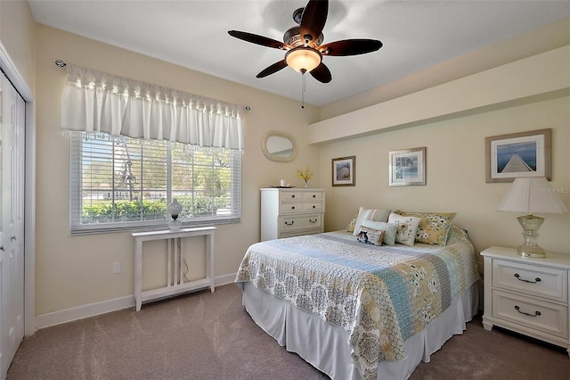 carpeted bedroom with a ceiling fan, baseboards, and a closet