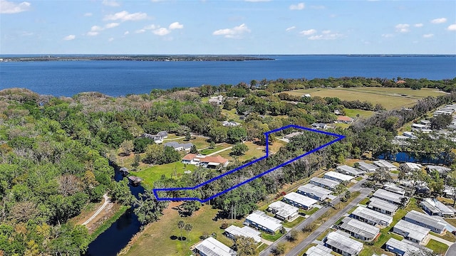 bird's eye view with a water view