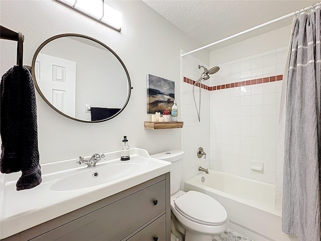 bathroom with toilet, vanity, a textured ceiling, and shower / tub combo