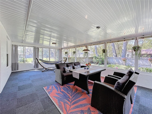 sunroom / solarium with wood ceiling