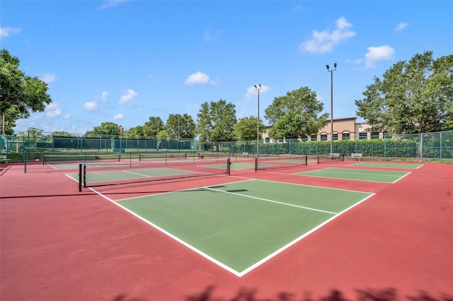 view of sport court with community basketball court and fence