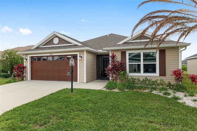 single story home featuring a front yard, an attached garage, driveway, and a shingled roof