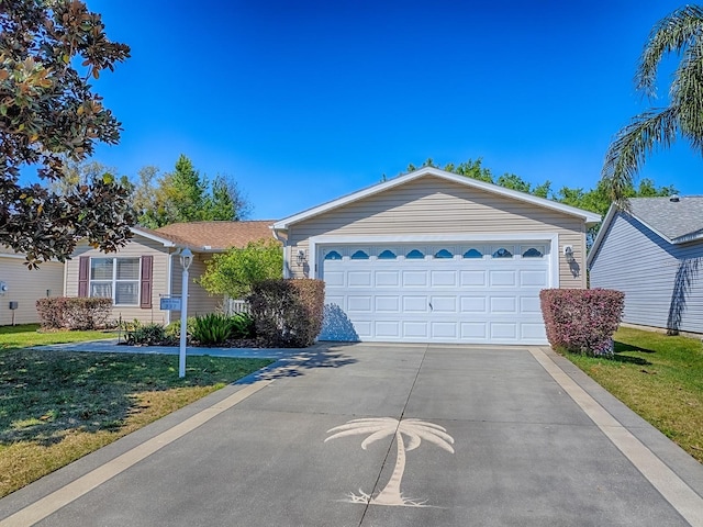 single story home featuring concrete driveway, a garage, and a front yard