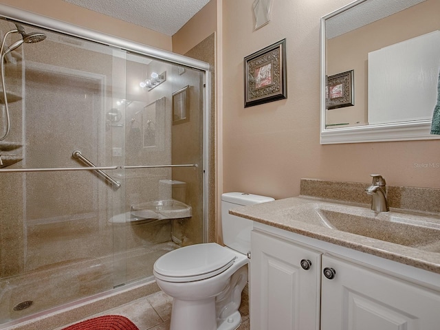 bathroom featuring tile patterned flooring, a textured ceiling, toilet, and a stall shower