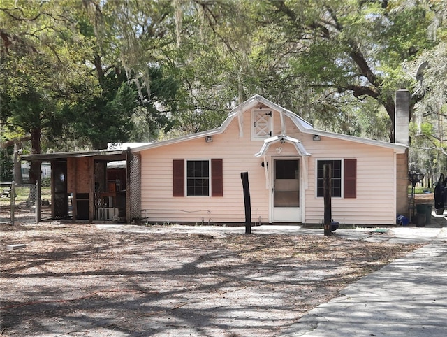 view of front of house with a chimney