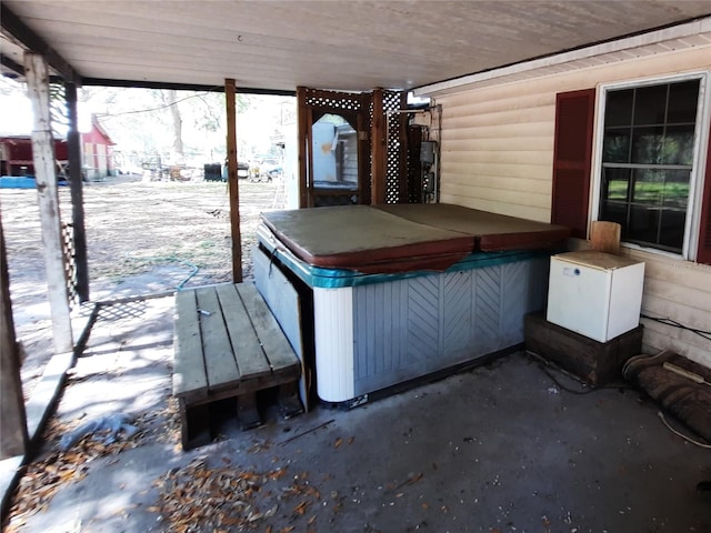 view of patio with a hot tub