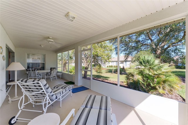 sunroom / solarium with ceiling fan