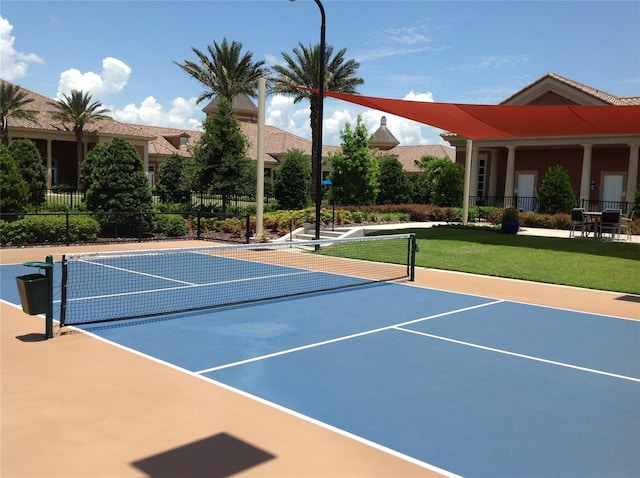 view of sport court with fence and community basketball court