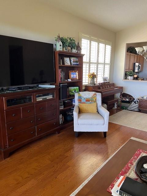 living area with wood finished floors