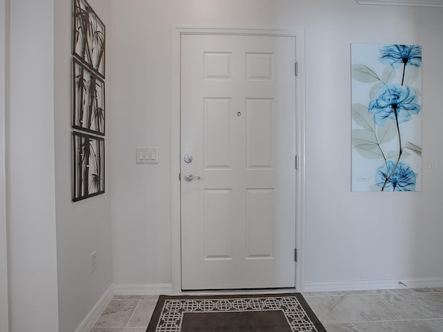 1829 Foxwood Ln, The Villages, FL 32162 - foyer entrance featuring baseboards