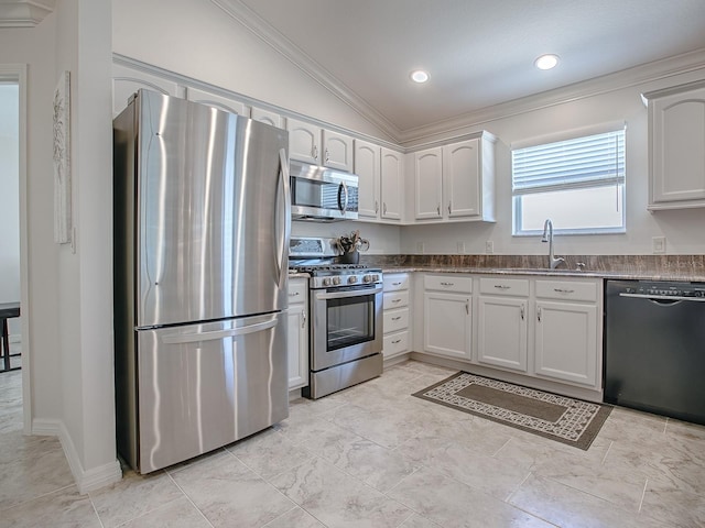 1829 Foxwood Ln, The Villages, FL 32162 - kitchen featuring a sink, ornamental molding, vaulted ceiling, stainless steel appliances, and dark countertops