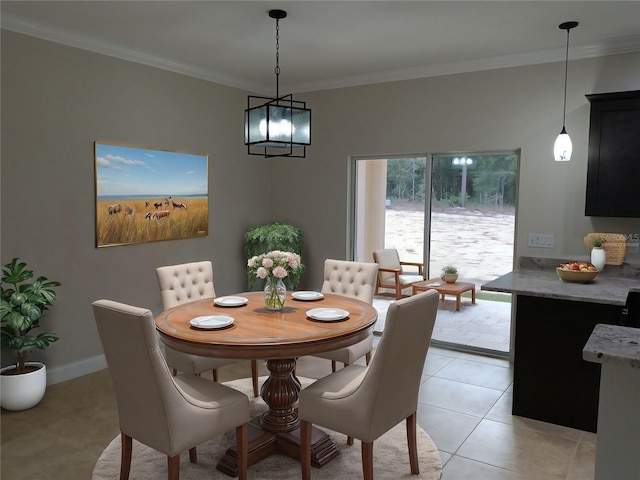 dining room with light tile patterned floors, baseboards, and crown molding