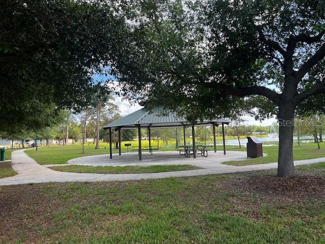 view of property's community featuring a gazebo and a lawn