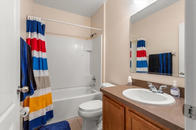 bathroom featuring toilet, tile patterned floors, vanity, and shower / bath combo with shower curtain