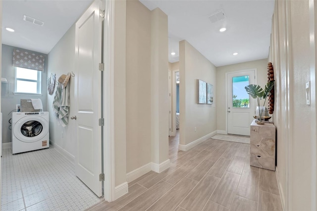 981 Fiesta Key Cir, Lady Lake, FL 32159 - laundry area featuring washer / dryer, healthy amount of natural light, baseboards, and recessed lighting