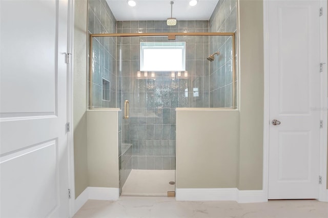 981 Fiesta Key Cir, Lady Lake, FL 32159 - full bath with a shower stall, baseboards, and marble finish flooring