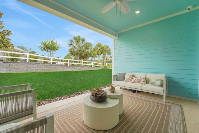 981 Fiesta Key Cir, Lady Lake, FL 32159 - wooden deck with ceiling fan and a patio