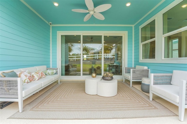 981 Fiesta Key Cir, Lady Lake, FL 32159 - wooden deck featuring an outdoor living space and ceiling fan