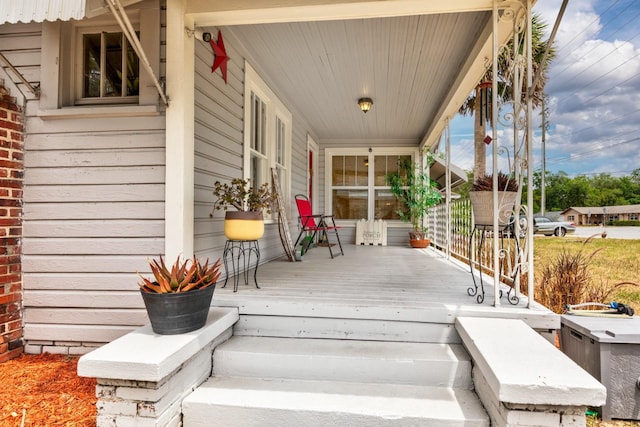 deck featuring covered porch