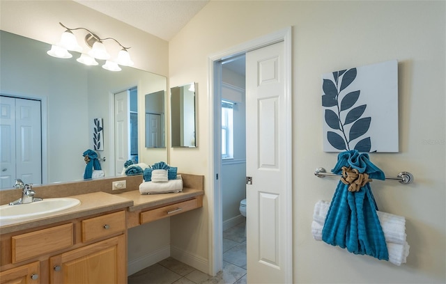 1046 Ridgeland Path, The Villages, FL 32162 - full bathroom with tile patterned floors, toilet, baseboards, and vanity