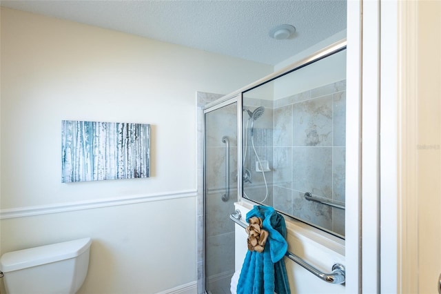 1046 Ridgeland Path, The Villages, FL 32162 - full bath with toilet, a stall shower, and a textured ceiling