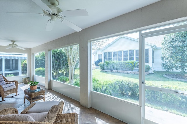 1046 Ridgeland Path, The Villages, FL 32162 - sunroom / solarium featuring a ceiling fan and tile patterned flooring