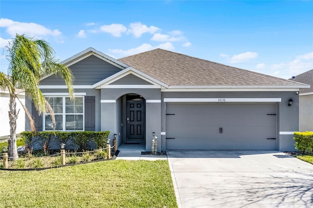 2636 Neverland Dr, New Smyrna Beach, FL 32168 - ranch-style house with stucco siding, an attached garage, driveway, and roof with shingles