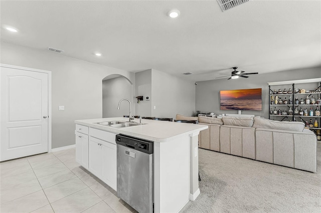 2636 Neverland Dr, New Smyrna Beach, FL 32168 - kitchen featuring arched walkways, visible vents, dishwasher, and a sink