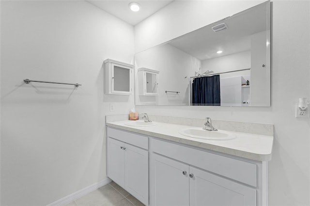 2636 Neverland Dr, New Smyrna Beach, FL 32168 - bathroom featuring a shower with shower curtain, double vanity, baseboards, and a sink