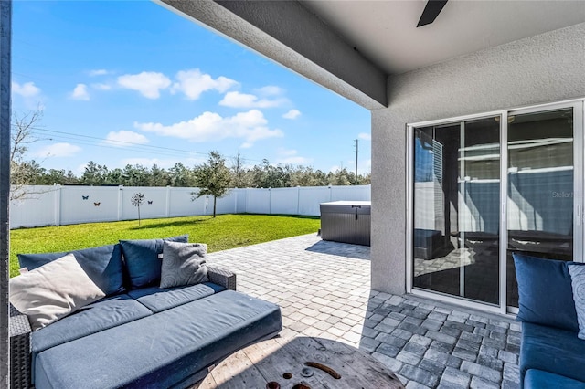 2636 Neverland Dr, New Smyrna Beach, FL 32168 - view of patio / terrace with ceiling fan, a fenced backyard, and an outdoor hangout area