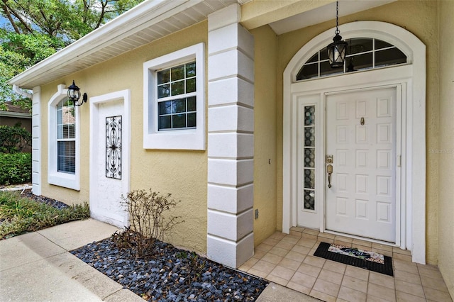 6152 Topsail Rd, Lady Lake, FL 32159 - entrance to property featuring stucco siding