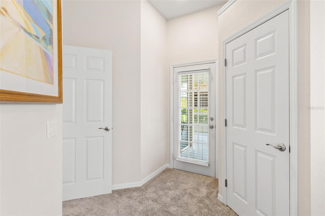 6152 Topsail Rd, Lady Lake, FL 32159 - entryway featuring carpet flooring