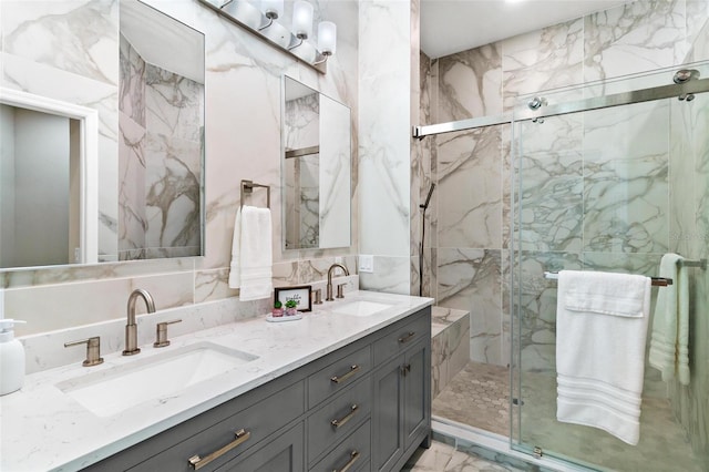 6152 Topsail Rd, Lady Lake, FL 32159 - bathroom with a marble finish shower, marble finish floor, and a sink